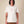 T-shirt BUMA X BRAGHE colore Naturale vista da davanti, con piccola stampa rosa BUMA X BRAGHE al centro del petto