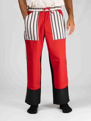 Pantaloni L'ALTROMONDO Limited Edition rossi e neri con tasche a righe bianche e nere, vista frontale