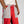 Dettaglio della vita e delle tasche frontali a righe dei pantaloni L'ALTROMONDO Limited Edition con coulisse rossa